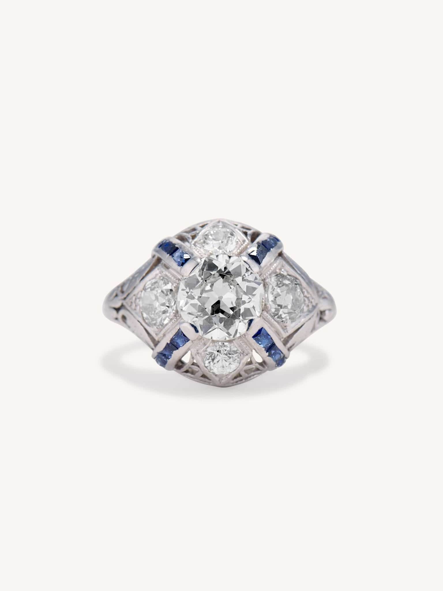 Art Deco 1.25 Carat Old European Cut Diamond and Sapphire Bombé Vintage Engagement Ring